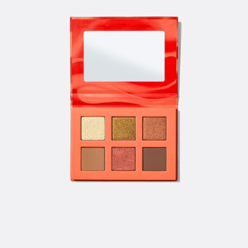 Open limited-edition Mary Kay Eye Shadow Palette in Inner Fire against white background