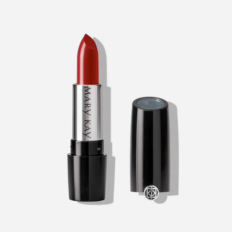An open tube of Mary Kay Gel Semi-Shine Lipstick in the shade Red Smolder.