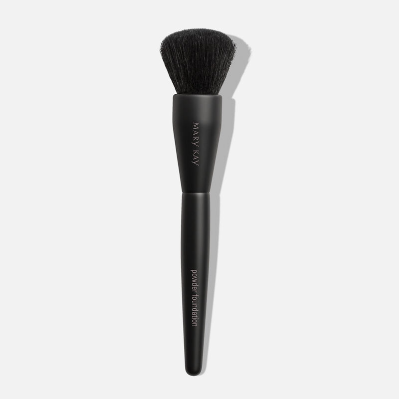 Mary Kay Powder Foundation Brush standing against a plain background