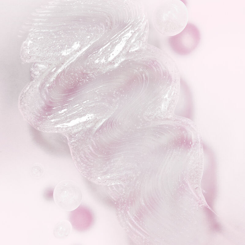 Product rub of Mary Kay Exfoliating Scrub against light pink background