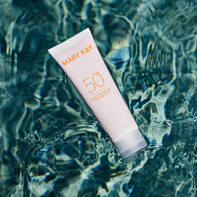 Bottle of Mary Kay&reg; Sunscreen SPF 50+ floating in water
