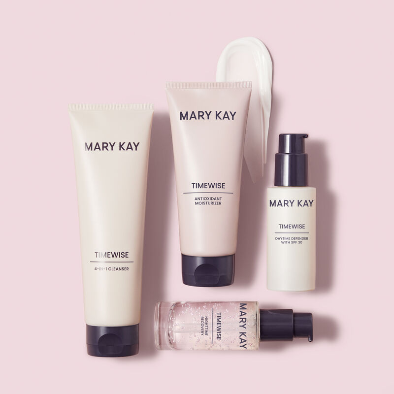 TimeWise Miracle Set styled with product rub against pink background
