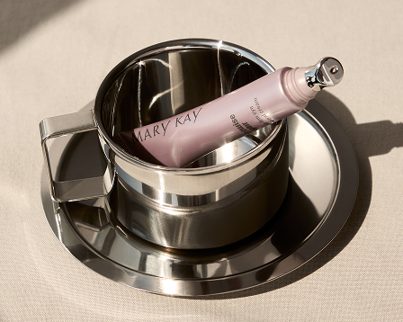 Eye Renewal Cream sitting in a coffee cup.